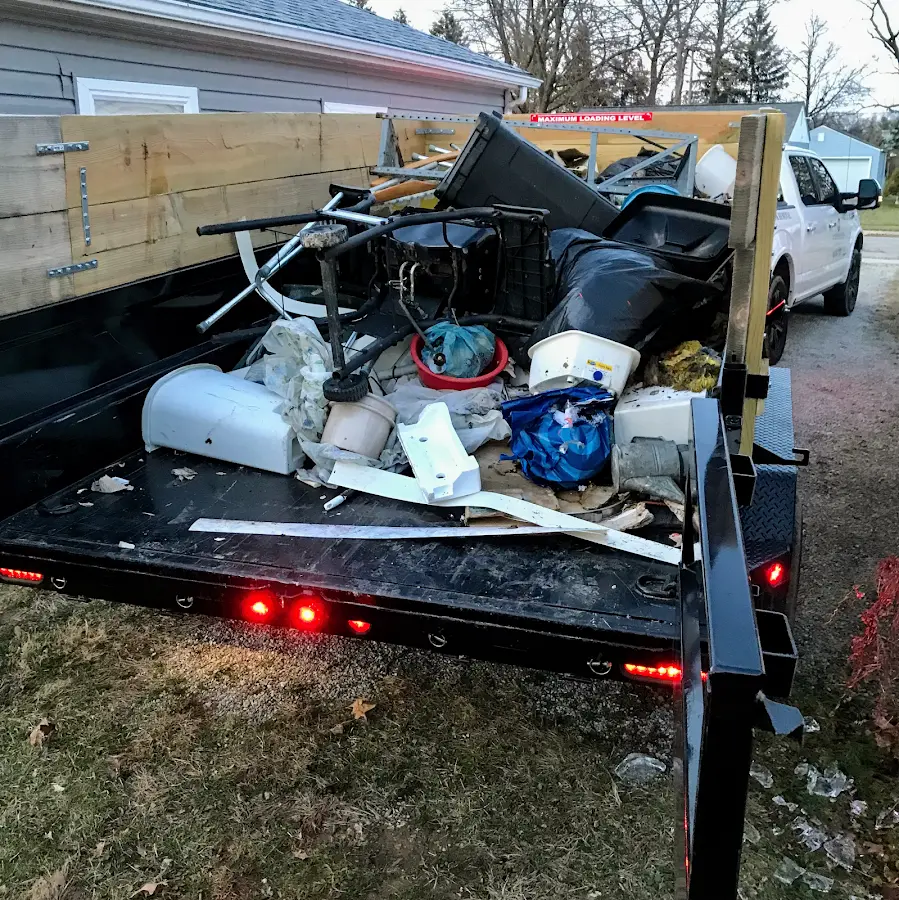 Roll-off dumpster delivered to a residential driveway in Graham